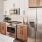 Open kitchen and living room with plenty of natural light.