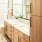 Bath with dual vanity, large mirror and glass enclosed shower